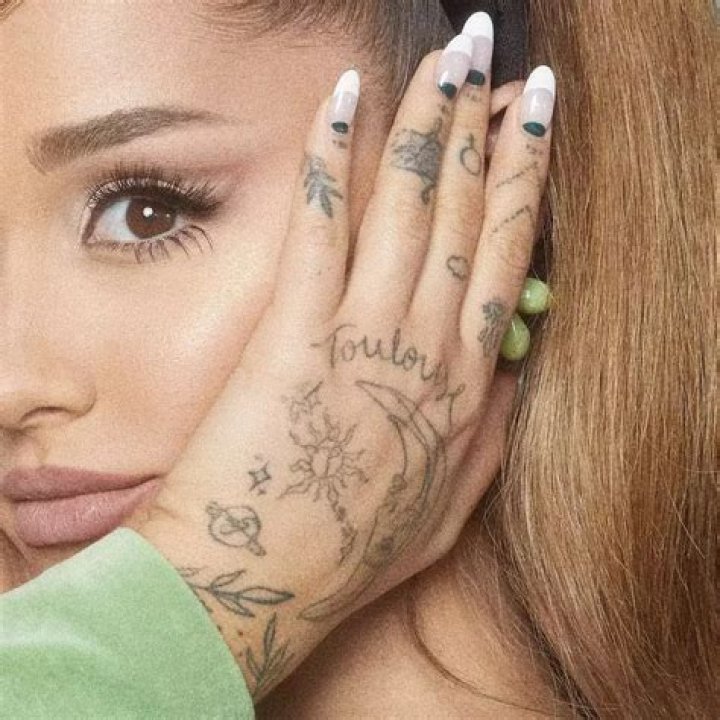 How many tattoos does Ariana Grande have?